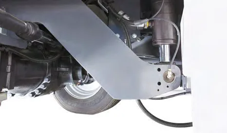 CHALLENGER 150 — close-up of the axle, wheel and hydraulic cylinder