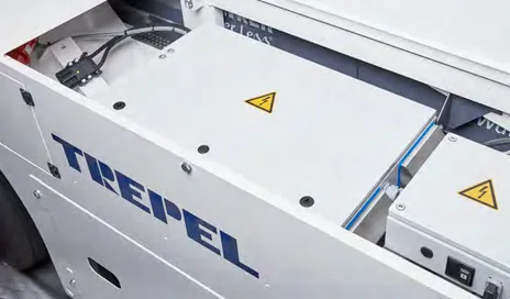 CHALLENGER 150e — opened side cover with electrical hazard warning labels