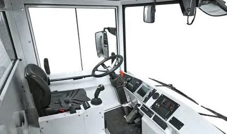 CHALLENGER 550 — glazed cab interior with steering wheel, joystick and instrument panel