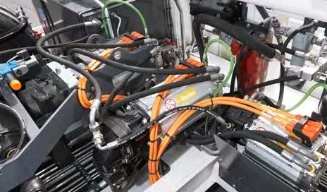 CHAMP 140e — orange high-voltage cables and connectors in the drive compartment