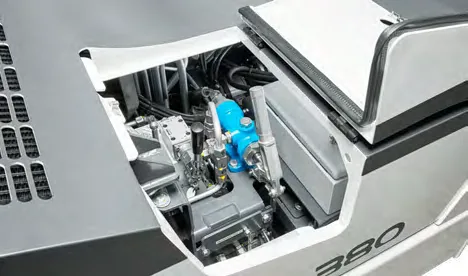 CHARGER 380 — open engine compartment with hydraulic components under the raised hood
